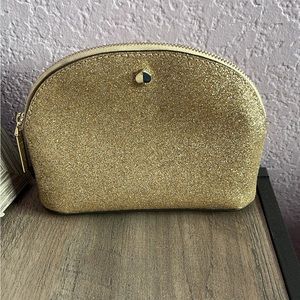 Kate spade rose gold makeup bag